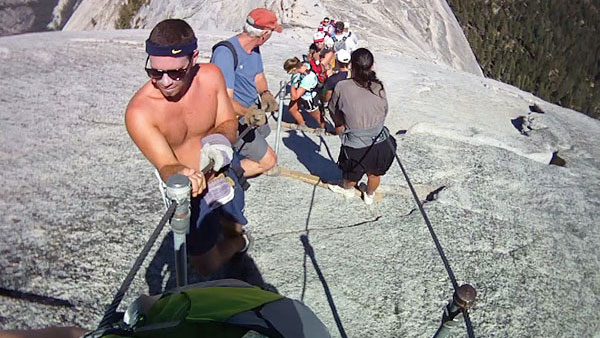 Hikers on Half Dome Cables