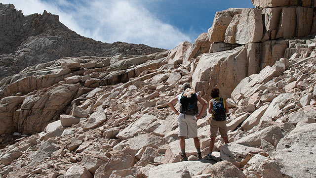 Hikers contemplate Mt. Whitney's Moraines