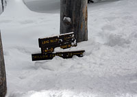 Round Valley Sign Buried in Snow