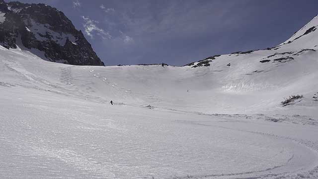 Skiing Below Birch Mountain's North Face