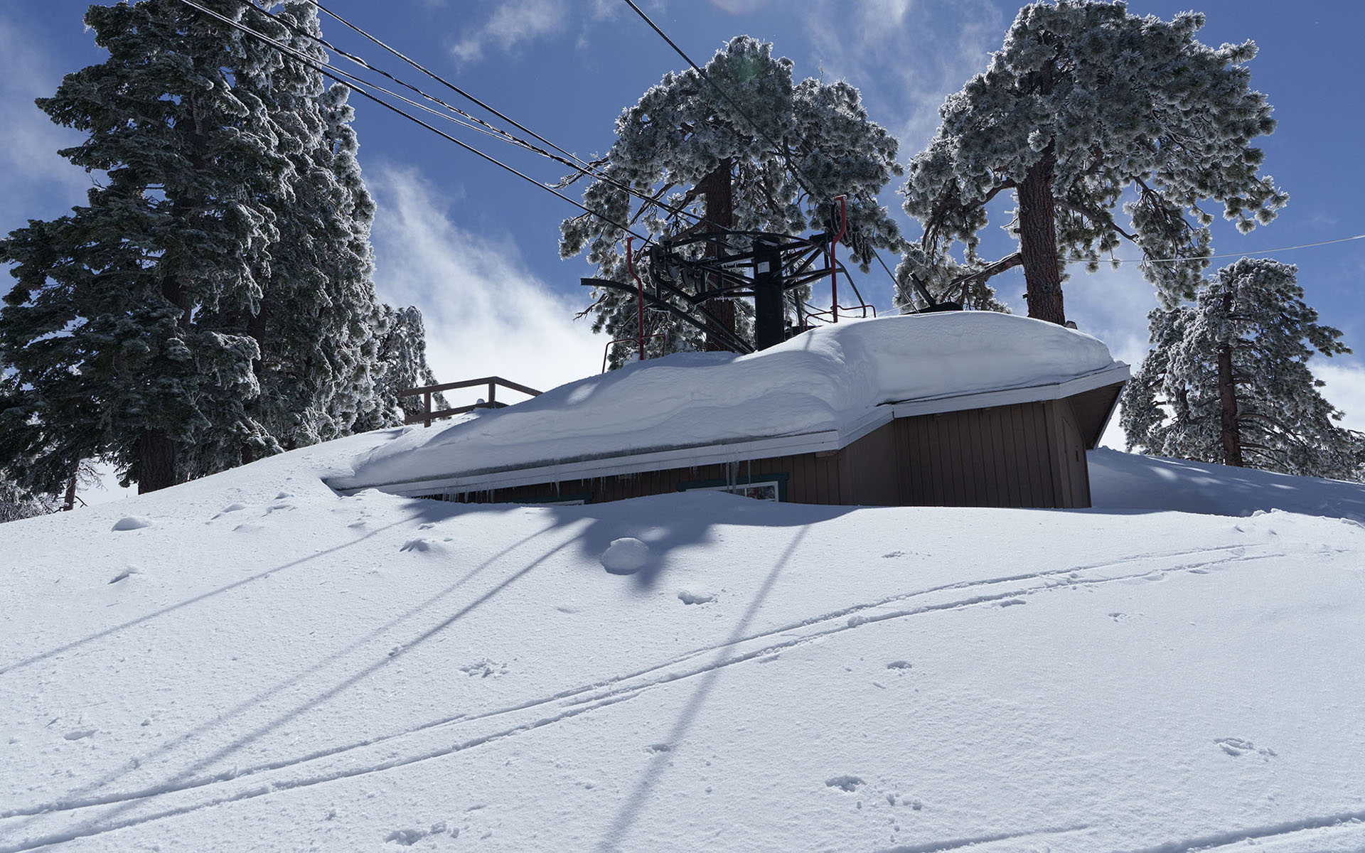 snow-buried hut at Mount Waterman, CA